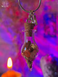 Business Success talisman necklace with a moon - pentagram charm, glass vial filled with jasper, clove and cinnamon.