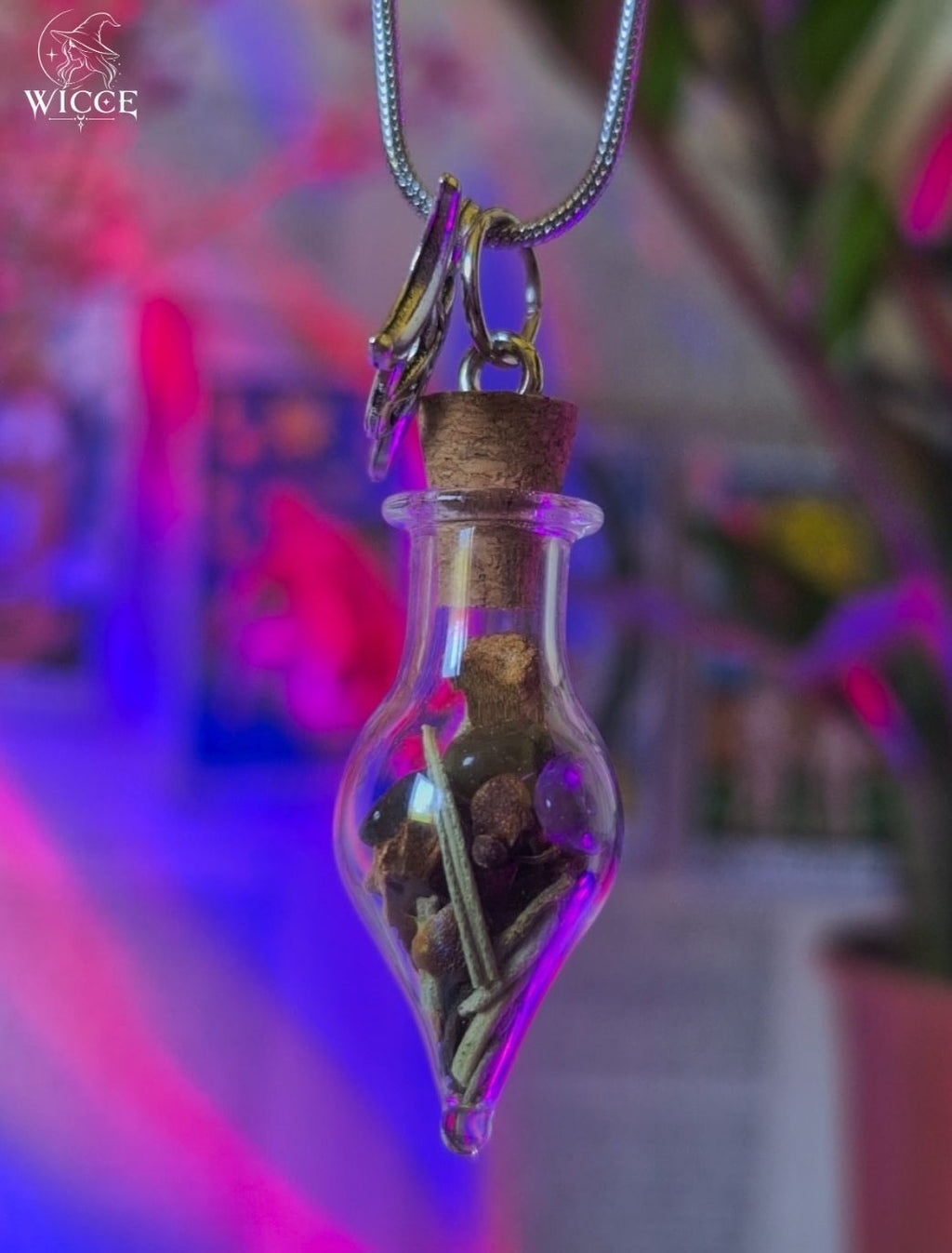 Dream Manifestation talisman necklace with a triple moon charm, glass vial filled with rosemary, amethyst, labradorite and cinnamon.
