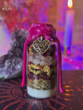 Love Attraction Spell Jar for Soulmate Energy with pink wax, rose quartz, rose petals, lavander, herbs and a heart charm