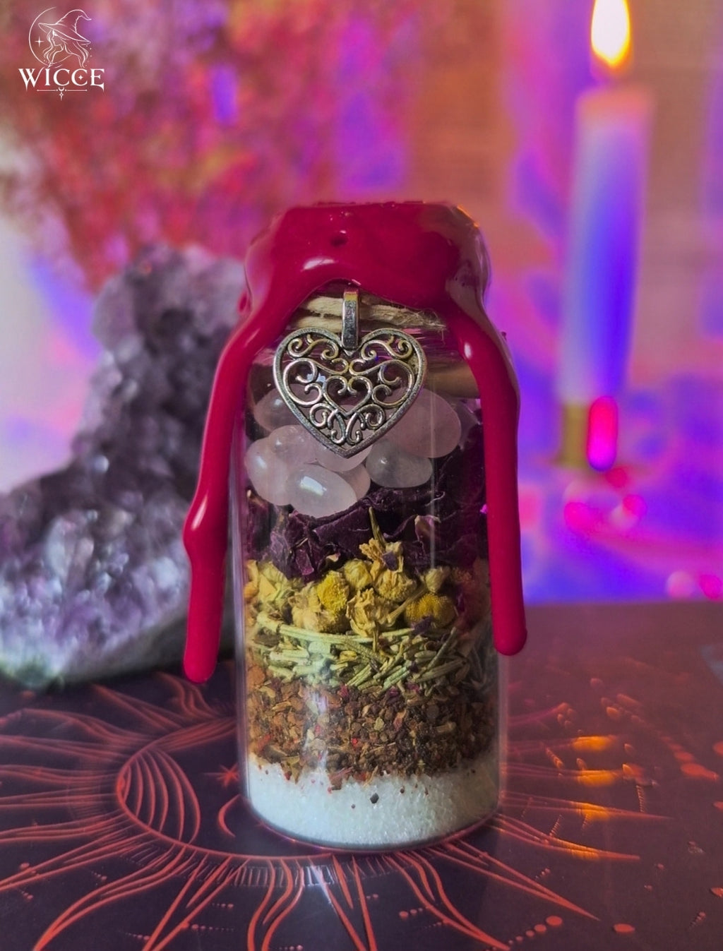 Love Bond Spell Jar for Passion, Connection & Deeper Intimacy with red wax, rose quartz, chamomile, rose petals, herbs, and a heart charm.