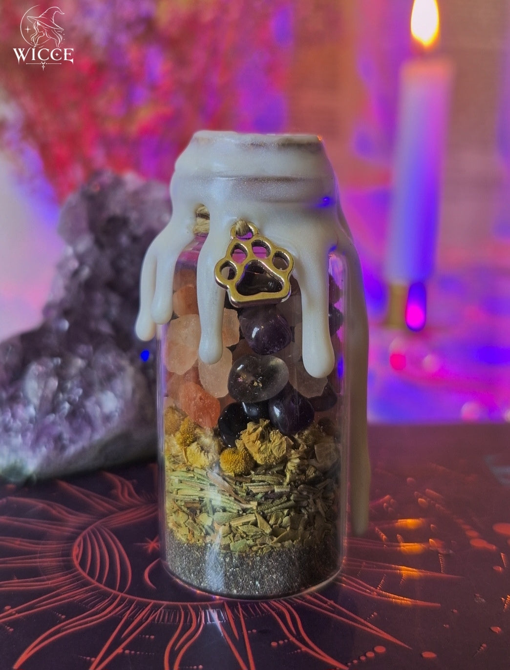 Pet Protection Spell Jar for Well-Being & Safe Energy with white wax, amethyst, himalayan salt, herbs,  and a paw charm.