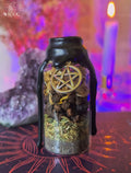 Protection & Shielding Spell Jar with black wax, black pepper, black salt, herbs and a pentagram charm.