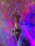 Protection talisman necklace with a pentagram charm, glass vial filled with black opsidian, rosemary, black salt and protective herbs.