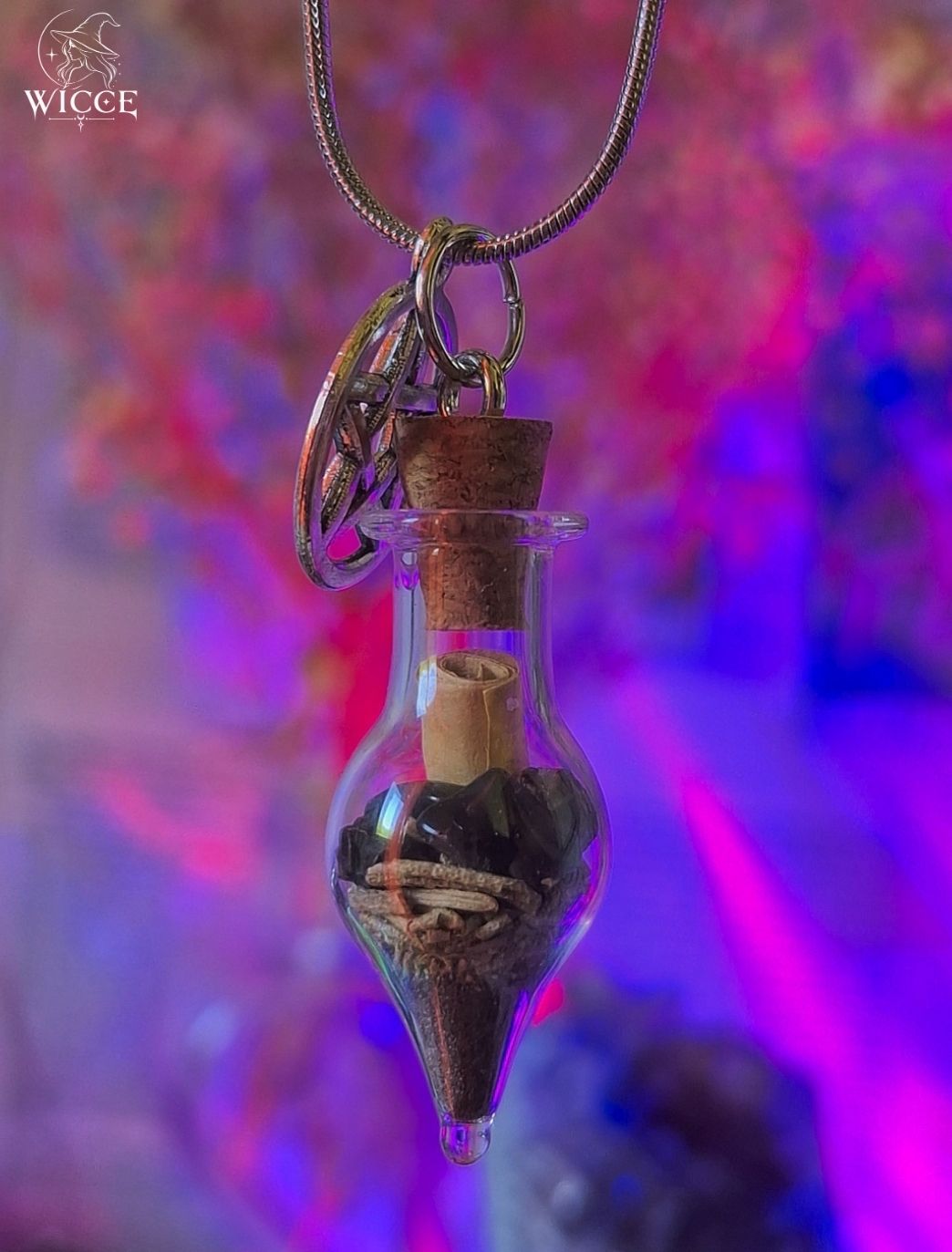 Protection talisman necklace with a pentagram charm, glass vial filled with black opsidian, rosemary, black salt and protective herbs.