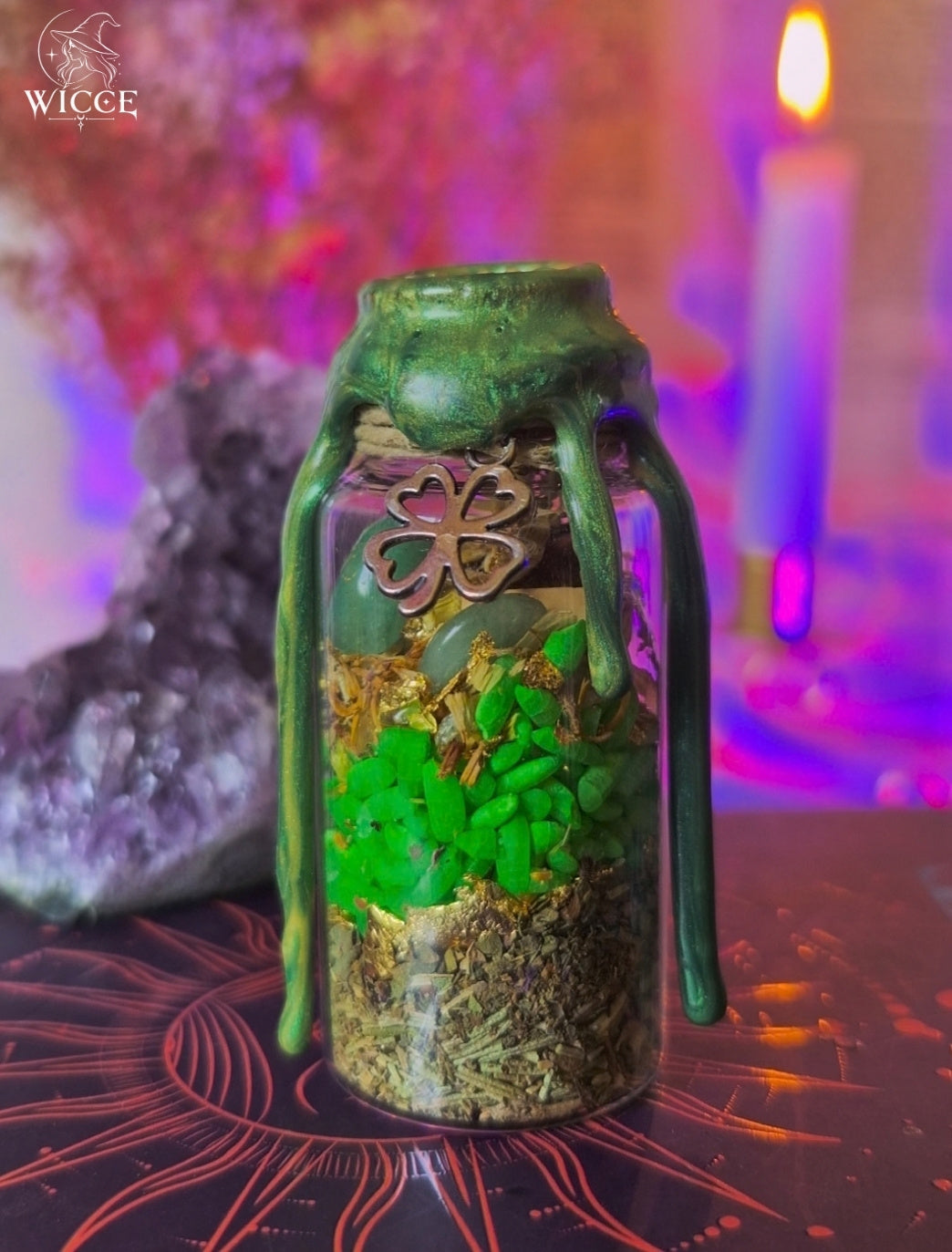 Steady Wealth Spell Jar for Stability & Lasting Prosperity with green wax, money rice, green aventurine, herbs and a clover charm.