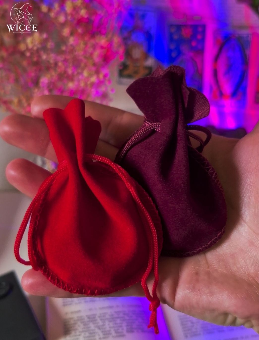 Traditional Slavic Amulet with Raskovnik in protective velvet pouches, held in a hand.